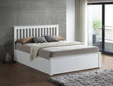 Ruislip wooden ottoman bed in white, closed, in a bedroom