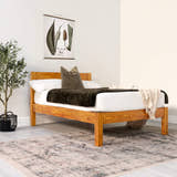 Mortlake wooden bed in solid pine, medium finish