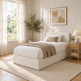 Hackney corduroy ottoman bed in cream, in a bright bedroom (AI-generated illustration of this frame; bedding for illustration, mattress not included)