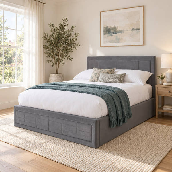 Holland grey velvet ottoman bed frame with a panelled headboard in a bright bedroom (AI-generated illustration of this frame; bedding for illustration, mattress not included)