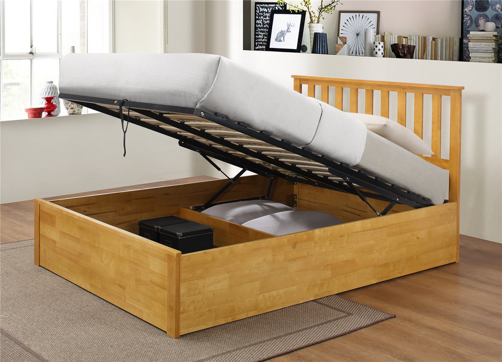 Morden ottoman bed in oak with the base lifted to show the storage