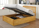 Morden ottoman bed in oak with the base lifted to show the storage