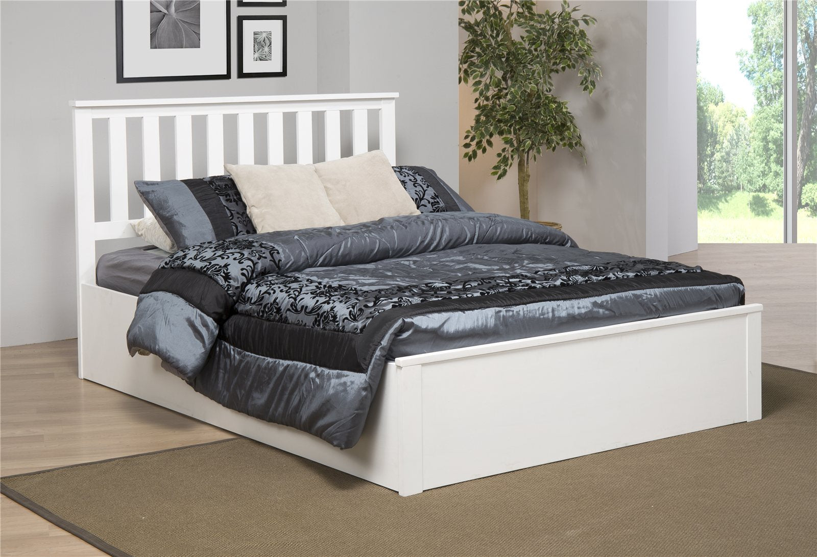 Morden solid rubberwood ottoman bed in white, in a bedroom