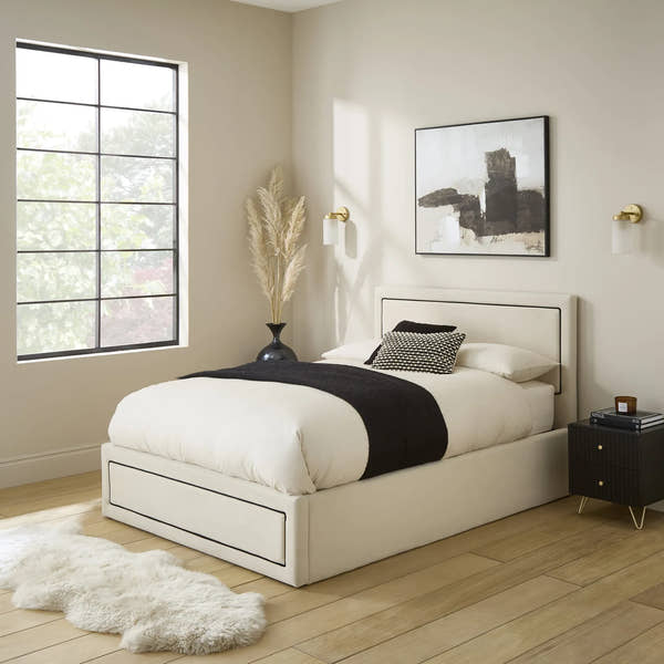 Savoy velvet ottoman bed frame with a deep padded headboard