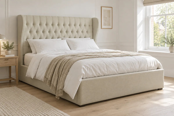 Sloane linen ottoman bed with a tall headboard, shown in a bright UK bedroom