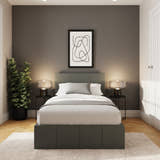 Stratford end lift ottoman bed, in grey, in a bedroom with one framed print