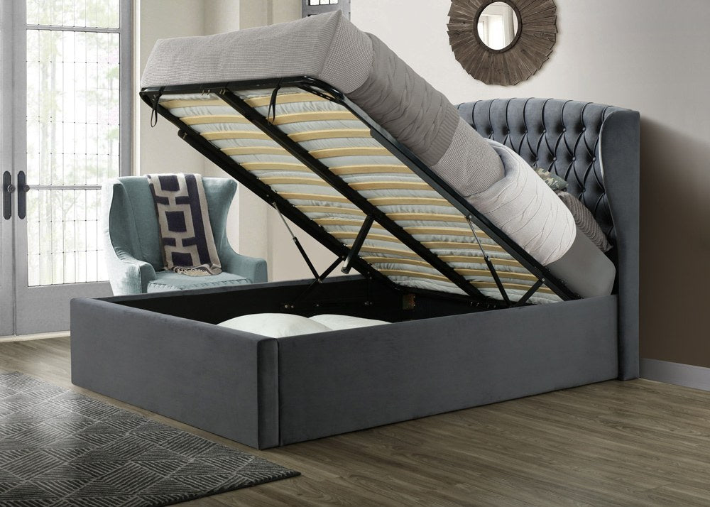 Lewisham velvet ottoman bed in grey velvet, with the gas lift base raised