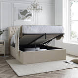 Lewisham velvet ottoman bed in natural velvet, with the gas lift base raised