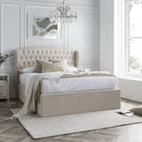 Lewisham velvet ottoman bed in natural velvet, closed, in a bedroom
