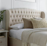 Lewisham velvet ottoman bed in natural velvet, close-up of the headboard