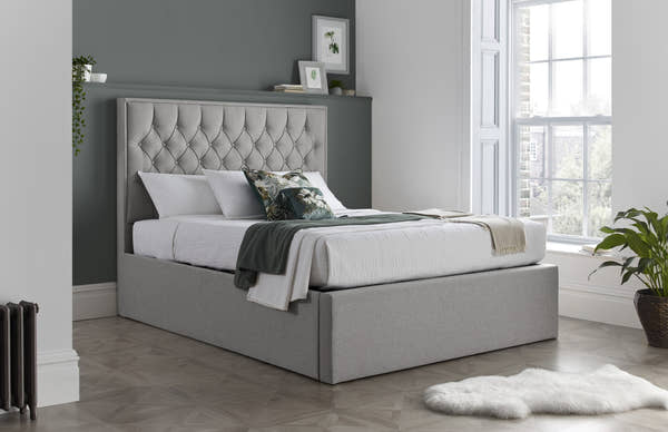 Wembley fabric ottoman bed in grey, closed, in a bedroom