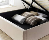 Wembley fabric ottoman bed in oatmeal, inside the fully boarded storage