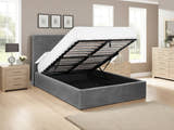 Wimbledon smoked grey velvet ottoman bed, with the storage open, in a bedroom